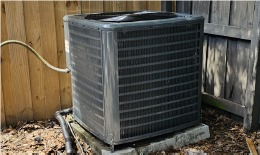 Outdoor condenser unit on its pad