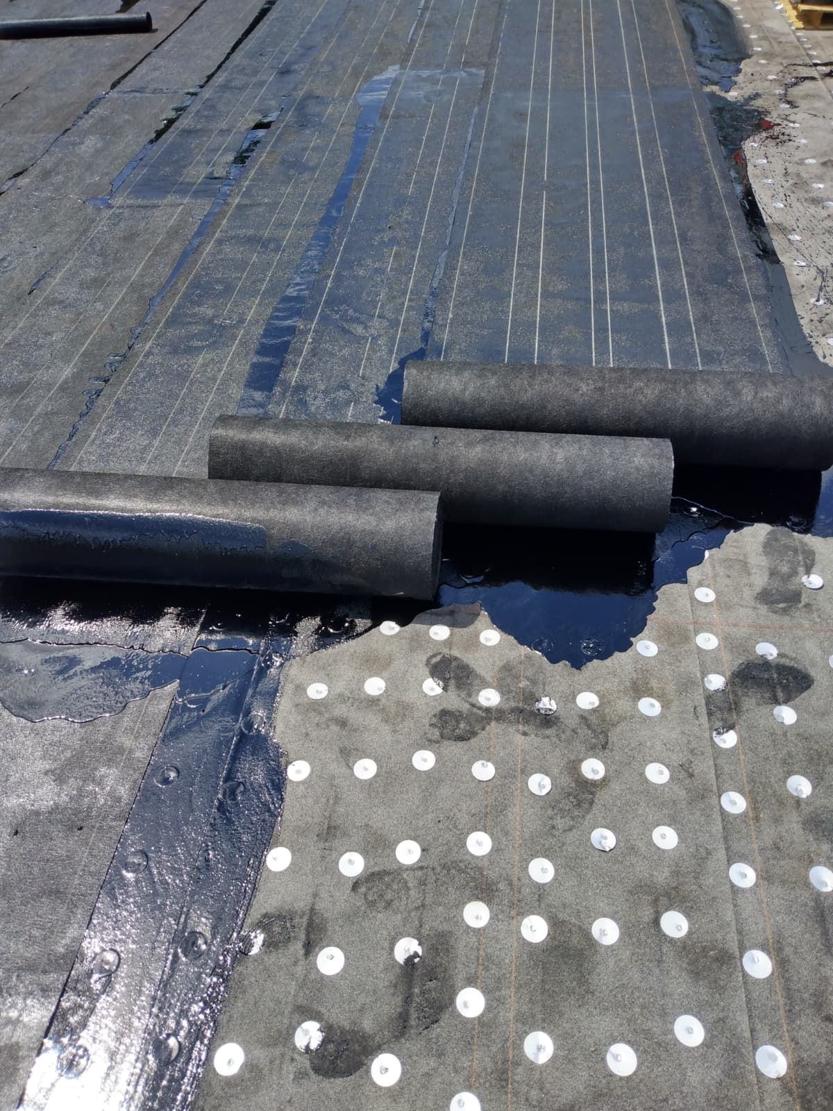 Membrane installation over fastened underlayment